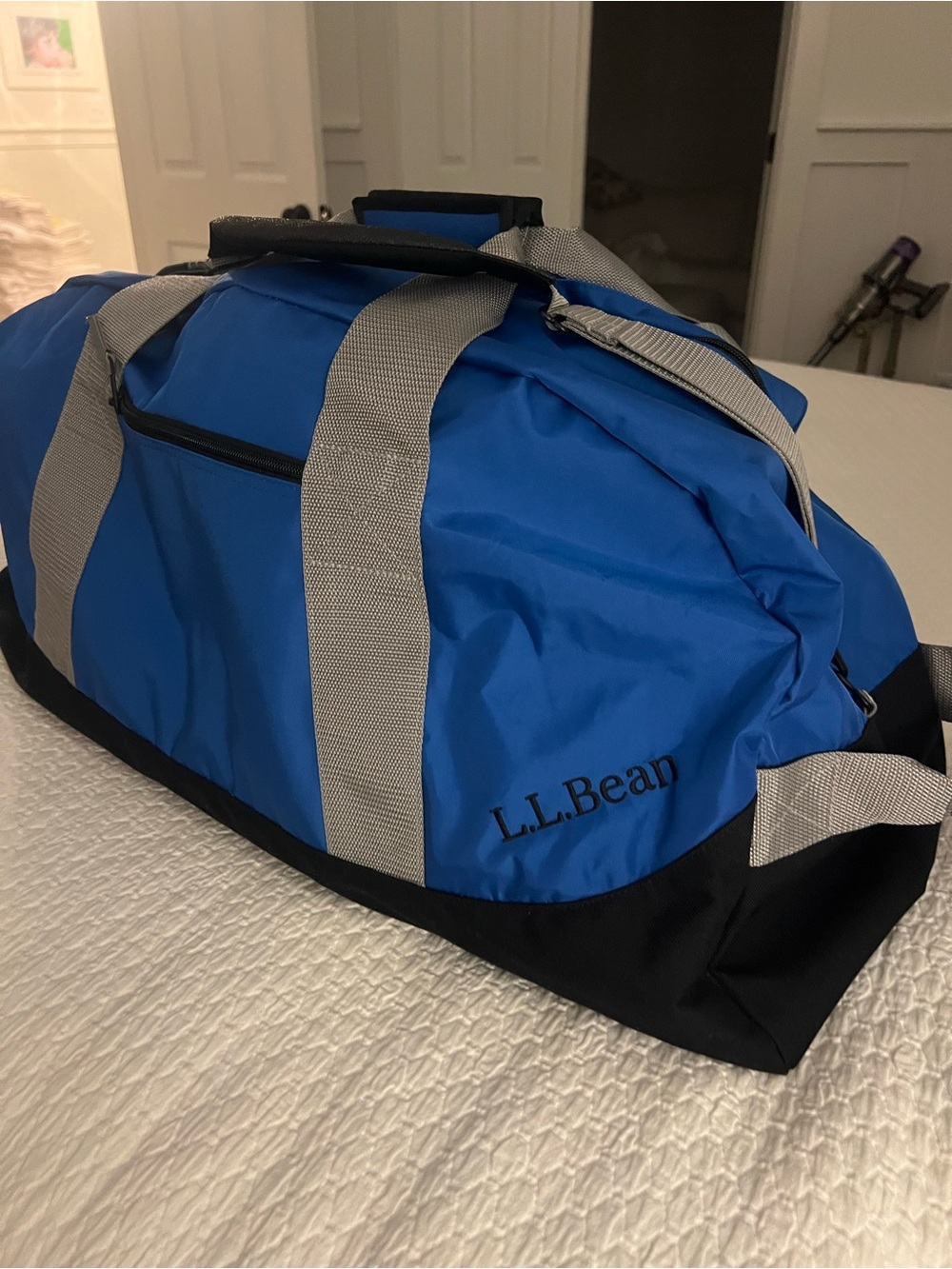 L.L.Bean Royal Blue and Black Duffel with Gray Straps. NEW without tags